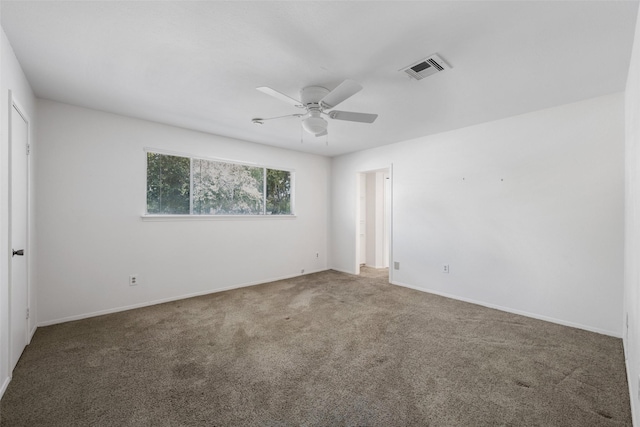 1403 Maygrove Dr, Sugar Land, TX 77498 - spare room featuring carpet floors and a ceiling fan