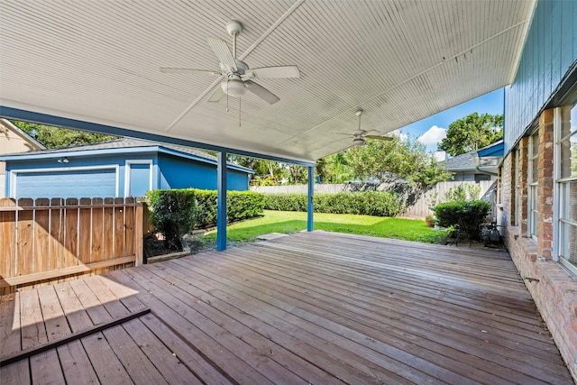 1403 Maygrove Dr, Sugar Land, TX 77498 - wooden terrace featuring ceiling fan and a fenced backyard