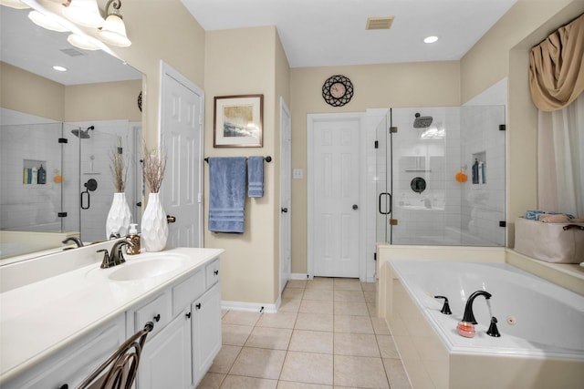 21006 Indigo Field Ln, Richmond, TX 77407 - bathroom featuring a tub with jets, a stall shower, tile patterned flooring, vanity, and recessed lighting