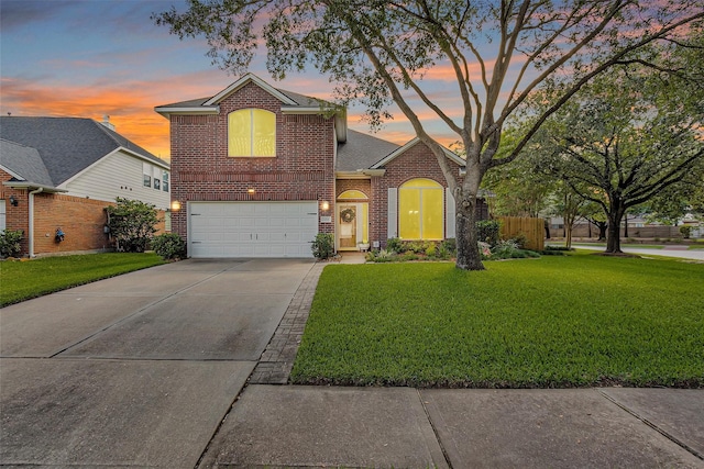 21006 Indigo Field Ln, Richmond, TX 77407 - traditional home with brick siding, driveway, a garage, and a shingled roof