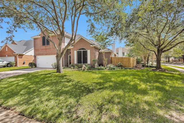 21006 Indigo Field Ln, Richmond, TX 77407 - traditional home with brick siding, concrete driveway, and an attached garage