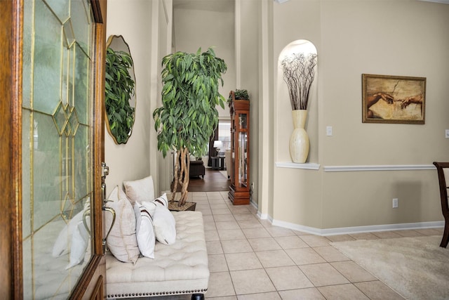 21006 Indigo Field Ln, Richmond, TX 77407 - hallway featuring light tile patterned floors and baseboards