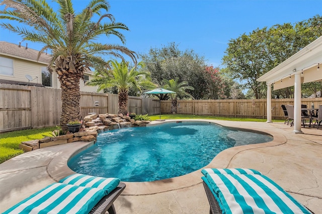 21006 Indigo Field Ln, Richmond, TX 77407 - view of pool with a patio area and a fenced backyard