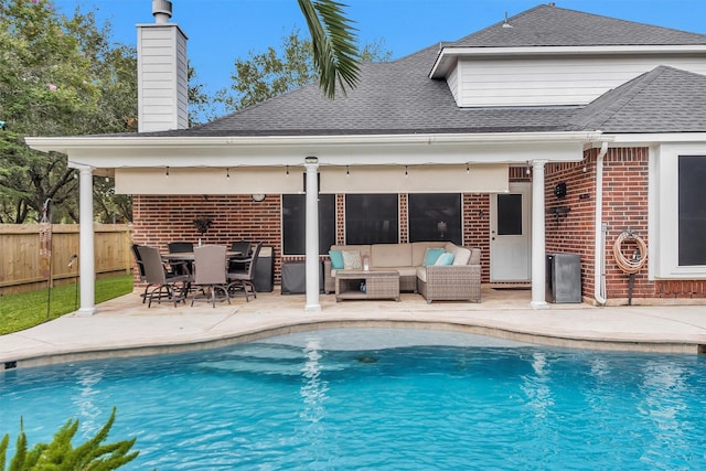 21006 Indigo Field Ln, Richmond, TX 77407 - view of swimming pool featuring a patio and an outdoor living space
