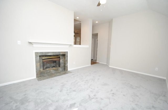 807 Epperson Way Ct, Sugar Land, TX 77479 - unfurnished living room with a tile fireplace, a ceiling fan, carpet flooring, and recessed lighting
