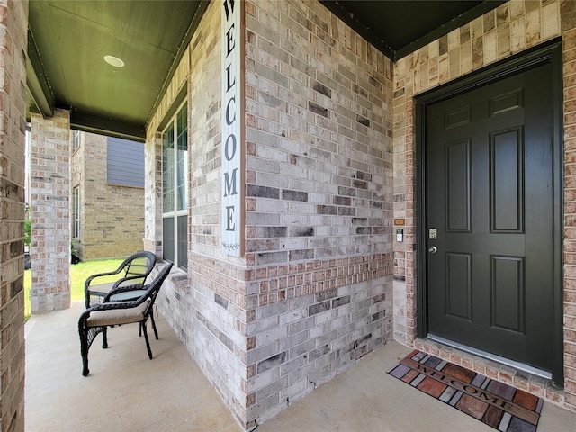 6322 Cambrai Wood Ln, Katy, TX 77493 - entrance to property featuring covered porch and brick siding