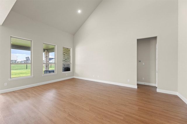 6322 Cambrai Wood Ln, Katy, TX 77493 - spare room with high vaulted ceiling, wood finished floors, and recessed lighting