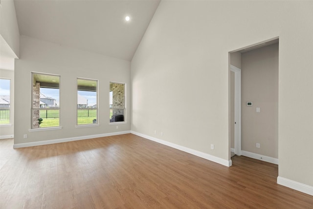 6322 Cambrai Wood Ln, Katy, TX 77493 - spare room with high vaulted ceiling, light wood-style floors, and recessed lighting