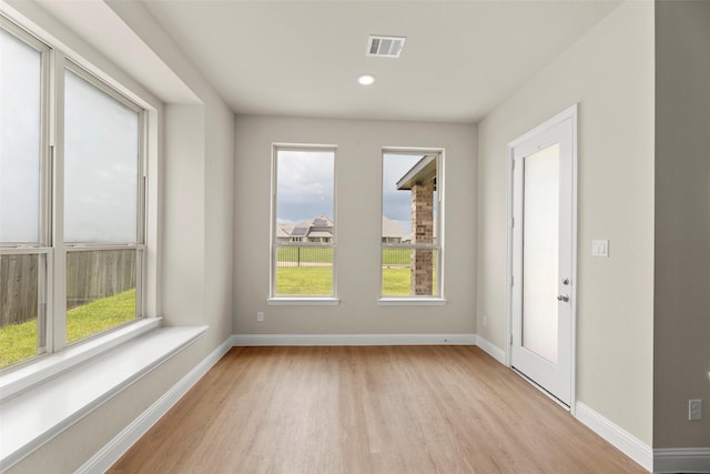 6322 Cambrai Wood Ln, Katy, TX 77493 - empty room featuring light wood-style flooring and recessed lighting