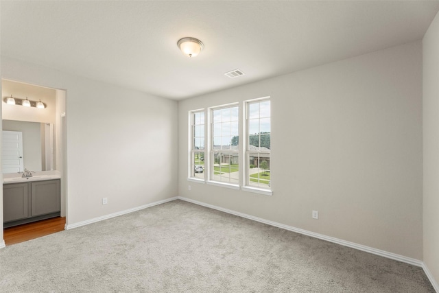 6322 Cambrai Wood Ln, Katy, TX 77493 - unfurnished bedroom featuring carpet flooring and connected bathroom