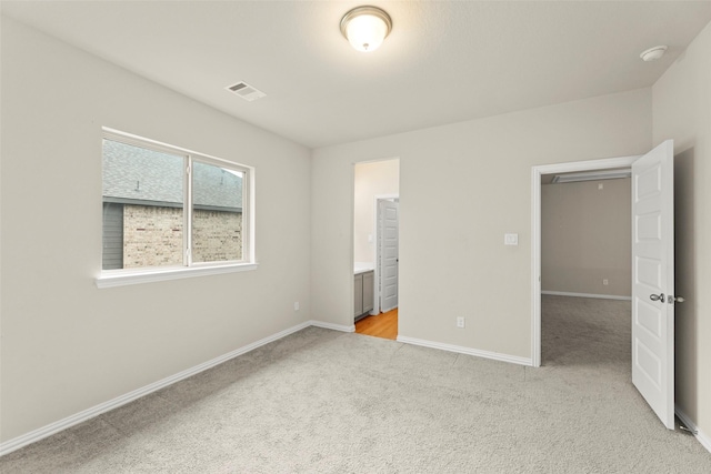 6322 Cambrai Wood Ln, Katy, TX 77493 - unfurnished bedroom featuring light carpet and baseboards