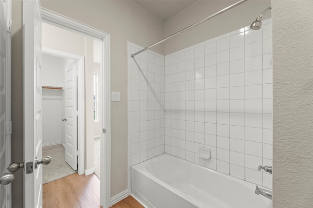6322 Cambrai Wood Ln, Katy, TX 77493 - bathroom featuring wood finished floors and shower / bathtub combination