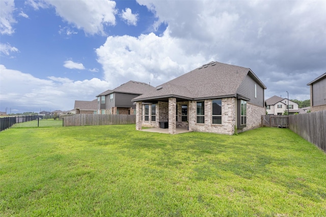 6322 Cambrai Wood Ln, Katy, TX 77493 - rear view of property with brick siding, a patio, a fenced backyard, and roof with shingles