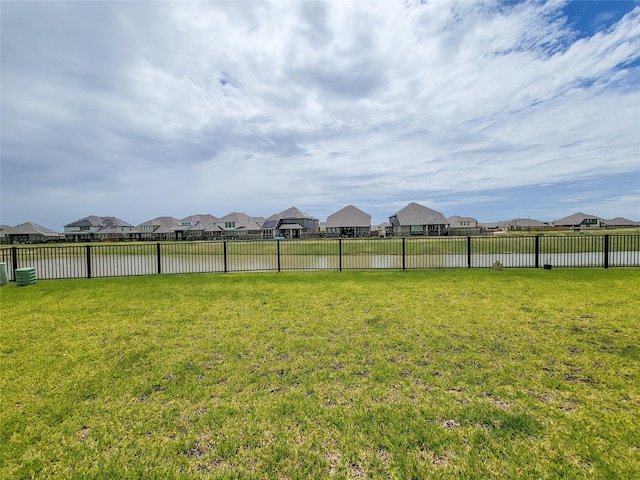 6322 Cambrai Wood Ln, Katy, TX 77493 - fenced backyard with a residential view and a water view