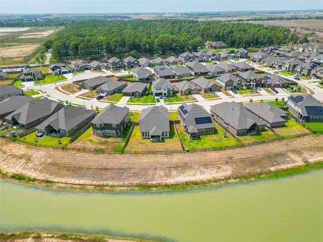 6322 Cambrai Wood Ln, Katy, TX 77493 - aerial perspective of suburban area with a large body of water