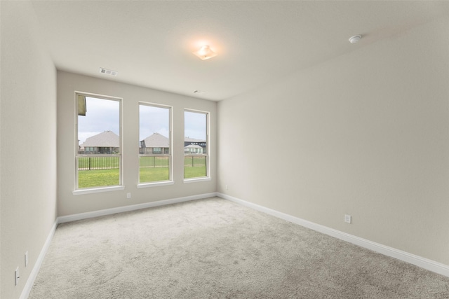 6322 Cambrai Wood Ln, Katy, TX 77493 - carpeted spare room featuring baseboards and a smoke detector