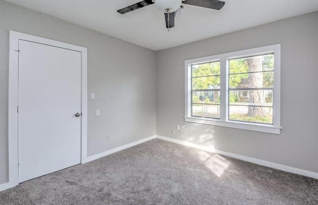 1506 Clay St, Brenham, TX 77833 - unfurnished room with carpet floors and ceiling fan