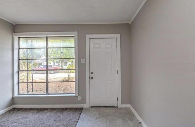 1506 Clay St, Brenham, TX 77833 - foyer featuring light colored carpet and ornamental molding