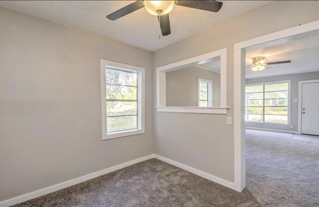 1506 Clay St, Brenham, TX 77833 - carpeted empty room featuring a ceiling fan and baseboards