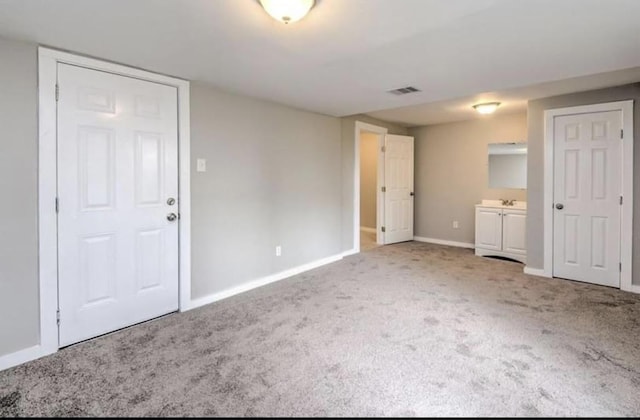 1506 Clay St, Brenham, TX 77833 - unfurnished bedroom featuring carpet floors and baseboards