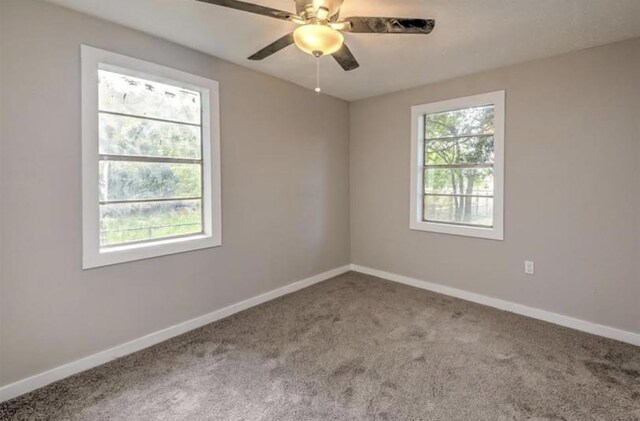 1506 Clay St, Brenham, TX 77833 - unfurnished room with carpet flooring and a ceiling fan