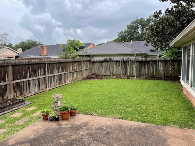3202 The Highlands Dr, Sugar Land, TX 77478 - fenced backyard with a patio area