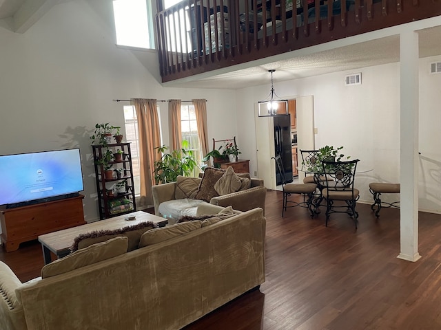 3202 The Highlands Dr, Sugar Land, TX 77478 - living room featuring dark wood finished floors and a towering ceiling