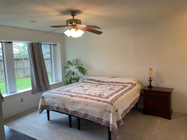 3202 The Highlands Dr, Sugar Land, TX 77478 - bedroom with carpet flooring, a textured ceiling, and a ceiling fan