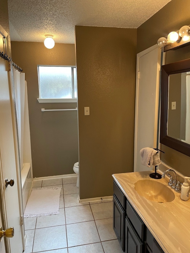 3202 The Highlands Dr, Sugar Land, TX 77478 - full bathroom featuring vanity, tile patterned floors, a textured ceiling, and shower / tub combo