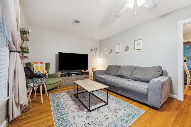 1130 W 30th St, Houston, TX 77018 - living area with light wood finished floors and ceiling fan