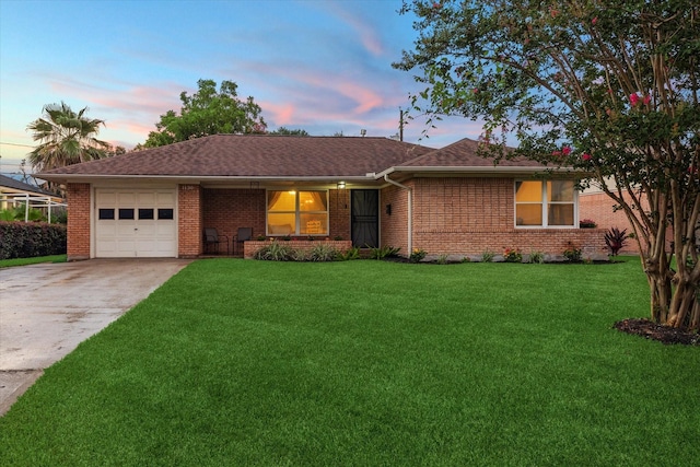 1130 W 30th St, Houston, TX 77018 - ranch-style home featuring driveway, an attached garage, a front lawn, brick siding, and a shingled roof