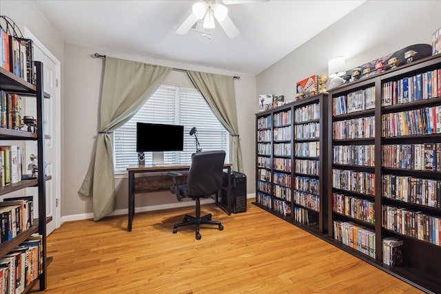 1130 W 30th St, Houston, TX 77018 - office featuring bookshelves, a ceiling fan, and wood finished floors