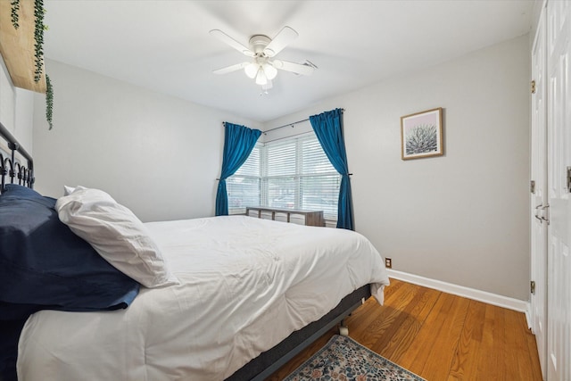 1130 W 30th St, Houston, TX 77018 - bedroom featuring wood finished floors and a ceiling fan