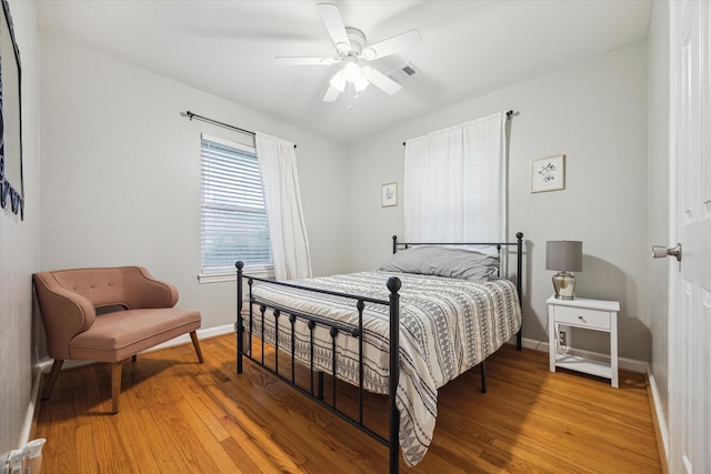 1130 W 30th St, Houston, TX 77018 - bedroom featuring light wood-type flooring and a ceiling fan