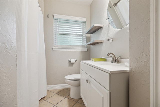 1130 W 30th St, Houston, TX 77018 - bathroom with a textured wall, tile patterned floors, vanity, and a shower with curtain