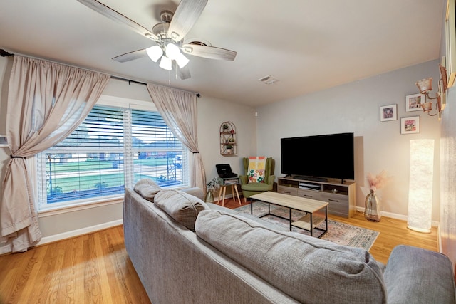 1130 W 30th St, Houston, TX 77018 - living area with wood finished floors and ceiling fan