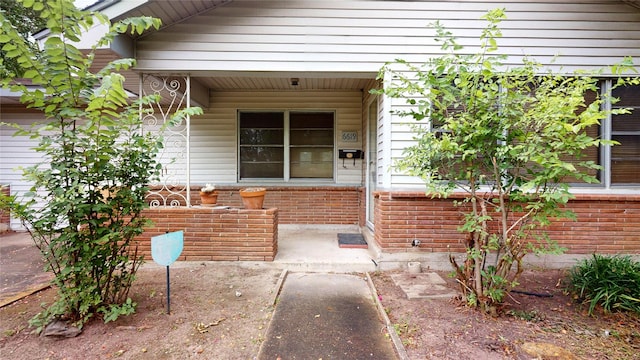 6619 Heron Dr, Houston, TX 77087 - doorway to property featuring brick siding