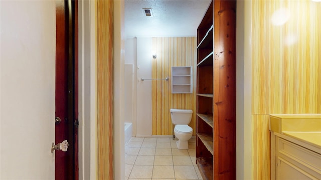 6619 Heron Dr, Houston, TX 77087 - bathroom featuring vanity, tile patterned flooring, and a textured ceiling