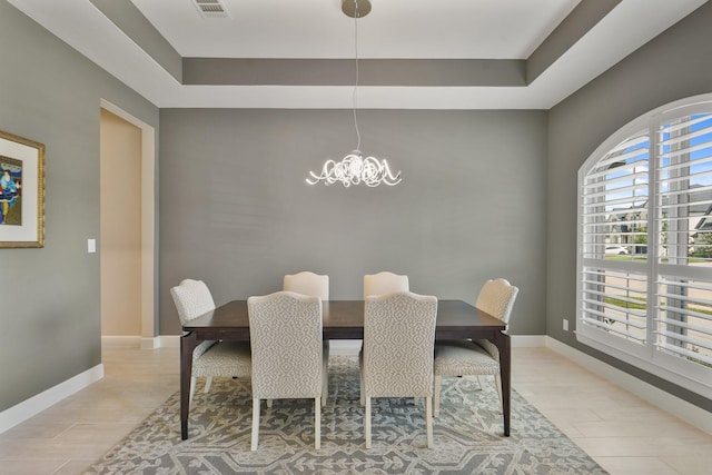 19019 Dappled Mare Cir, Tomball, TX 77377 - dining space with a chandelier and a tray ceiling