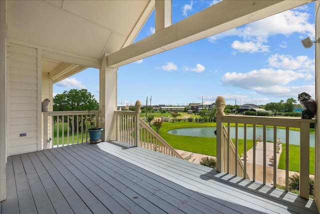2250 Broadway St, San Leon, TX 77539 - wooden terrace with a water view and a lawn