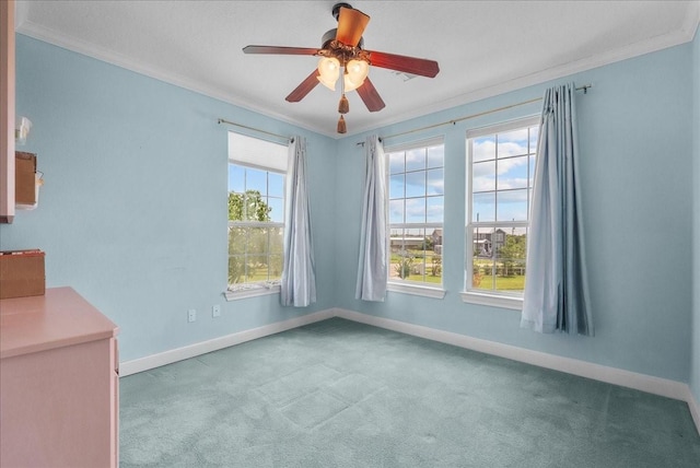 2250 Broadway St, San Leon, TX 77539 - empty room with ornamental molding, carpet flooring, and a ceiling fan