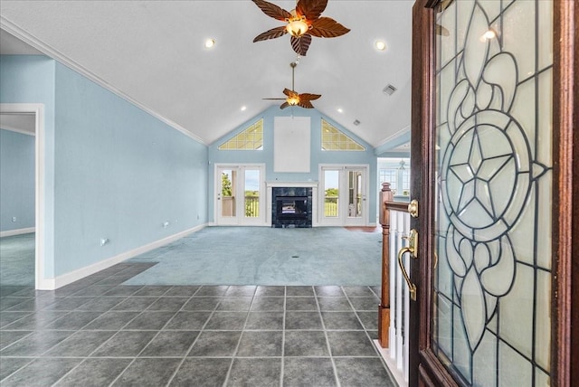 2250 Broadway St, San Leon, TX 77539 - unfurnished living room with dark carpet, a ceiling fan, dark tile patterned floors, a high end fireplace, and recessed lighting