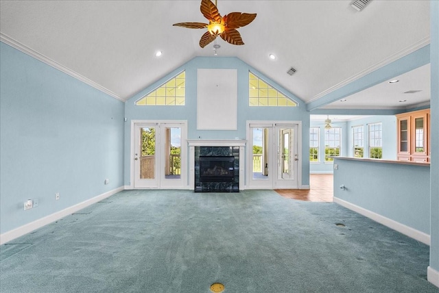 2250 Broadway St, San Leon, TX 77539 - unfurnished living room featuring a ceiling fan, carpet floors, a fireplace, plenty of natural light, and ornamental molding