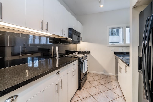 1395 Arlington St Unit 1395, Houston, TX 77008 - kitchen featuring black appliances, tasteful backsplash, light tile patterned flooring, white cabinets, and dark stone counters
