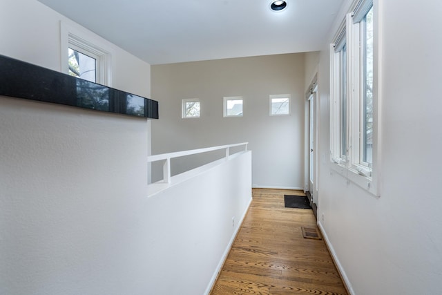 1395 Arlington St Unit 1395, Houston, TX 77008 - corridor with healthy amount of natural light, wood finished floors, and recessed lighting