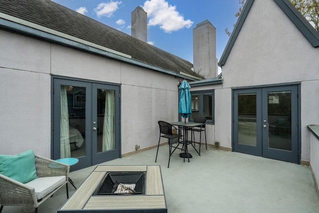 1395 Arlington St Unit 1395, Houston, TX 77008 - view of patio with french doors and a fire pit