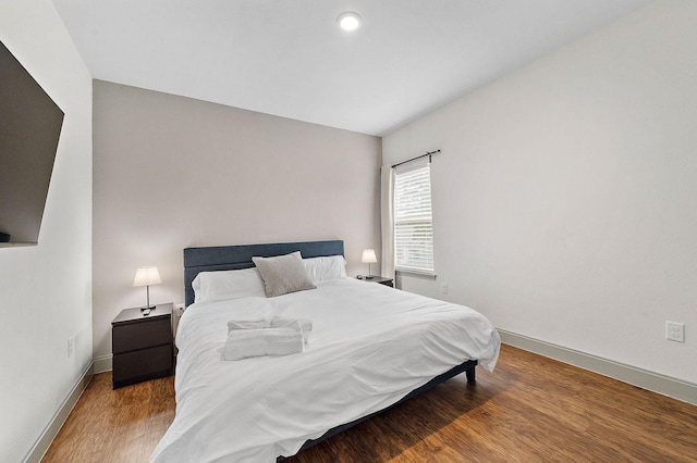 4209 Gunter St, Houston, TX 77020 - bedroom featuring baseboards and wood finished floors