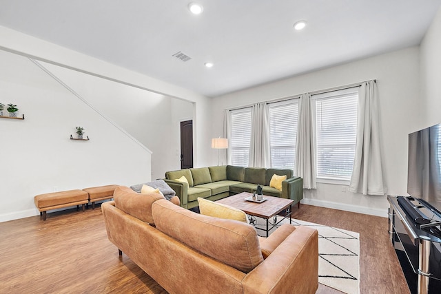 4209 Gunter St, Houston, TX 77020 - living area featuring light wood-type flooring and recessed lighting