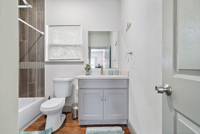 4209 Gunter St, Houston, TX 77020 - full bathroom featuring vanity, wood finished floors, and  shower combination
