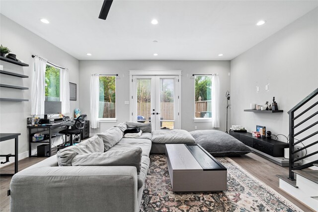 4510 Vernon St, Houston, TX 77020 - living area with wood finished floors, french doors, recessed lighting, stairs, and a ceiling fan